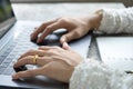 Closeup business woman hands typing on laptop keyboard on desk. Royalty Free Stock Photo