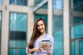 Closeup business woman hands using tablet computer outdoors. charming businesswoman surfing internet on digital device outside. Royalty Free Stock Photo