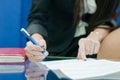 Closeup on woman hand write by pen Royalty Free Stock Photo