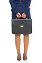 Closeup on business woman holding briefcase Royalty Free Stock Photo