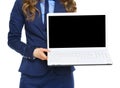 Closeup on business woman showing laptop blank screen Royalty Free Stock Photo