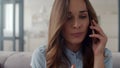 Closeup business woman speaking phone at home office. Negative emotion. Royalty Free Stock Photo