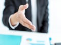 Closeup businessman hand reaching out for a handshake Royalty Free Stock Photo