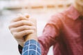 Closeup of a businessman hand shake businesswoman between two colleagues OK, succeed Royalty Free Stock Photo