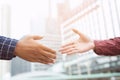 Closeup of a businessman hand shake businesswoman between two colleagues OK, succeed Royalty Free Stock Photo