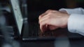 Businessman hands typing on laptop at workplace. Professional using computer Royalty Free Stock Photo