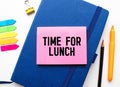 Closeup on businessman holding a card with text TIME FOR LUNCH, business concept Royalty Free Stock Photo