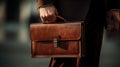 Closeup Of A Businessman Holding leather Briefcase Going To Work