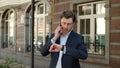 Closeup businessman talking on phone at street. Man having business talk outdoor Royalty Free Stock Photo