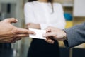 Closeup of businesspeople exchanging business card