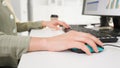 Closeup businesswoman hand use mouse and keyboard for summary project presentation on white desk before conference in meeting room