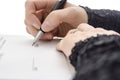 Closeup of a businesswoman signing a contract Royalty Free Stock Photo