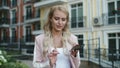 Closeup businesswoman using phone at street. Businesswoman talking smartphone Royalty Free Stock Photo