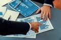 Closeup busy analyst team discussing financial data on laptop. Fervent Royalty Free Stock Photo