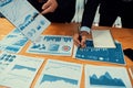 Closeup busy analyst team discussing financial data on laptop. Fervent Royalty Free Stock Photo