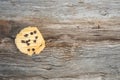 Closeup Butter cookies with chocolate chip topping on wooden ba