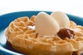 closeup butter waffle with vanilla icecream