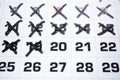 Closeup of a calendar with crossed off days