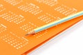 Closeup of calendar page and pencil. Royalty Free Stock Photo