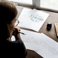 Closeup of a calligrapher working on a project Royalty Free Stock Photo