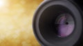 Closeup camera lens with blurred bokeh light