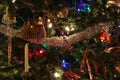 Closeup of a candle and other Decorations on a Christmas Tree Royalty Free Stock Photo