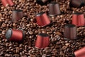 Closeup capsules with coffee of different varieties, for a capsule coffee machine