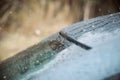 Closeup Car Wet Windshield and Windshield Wiper with Rain drop in Raining Season. Royalty Free Stock Photo