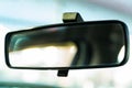 Blurred rear view mirror of modern car close up Royalty Free Stock Photo