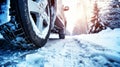 Closeup of car tires in winter on the road Royalty Free Stock Photo