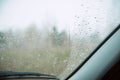 Closeup Car Wet Windshield and Windshield Wiper with Rain drop in Raining Season. Royalty Free Stock Photo