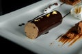 Closeup caramel creamy mousse with chocolate icing