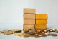 Closeup cardboard boxes with stack coins using as business and l