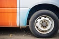 closeup of cargo van wheel and side panel Royalty Free Stock Photo