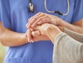 Closeup of caring nurse comforting senior patient in old age home. Zoomed in unknown elderly woman being supported Royalty Free Stock Photo