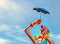 Closeup of a carnival clown statue