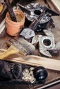 Closeup of carpentry tools in carpentry workshop. Cutter, brush, plane, shaving. Processing in vintage style.