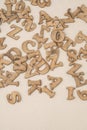 Closeup carved wooden alphabets as a background