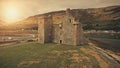 Closeup castle ruins at sun sea coast aerial. Historical heritage. Ancient tourist attraction