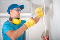 Electrician Stripping Wires