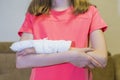 Closeup of Caucasian Female Injured Hand In Plaster