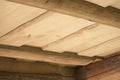 Closeup of ceiling of wooden planks from pine for log house Royalty Free Stock Photo