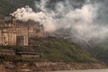 Closeup of cement plant smoke along Yangtze in Xinling region, Badong, China