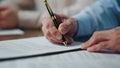 Closeup ceo hands signing contract office. Unknown man writing pen signature Royalty Free Stock Photo
