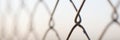 Closeup of chain link fence. Mesh netting on gray background Royalty Free Stock Photo