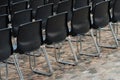 Chairs alignment at open air cinema on cobbestone place Royalty Free Stock Photo