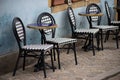 chairs and table at the restaurant terrasse in the street Royalty Free Stock Photo