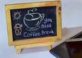 Closeup chalkboard with the phrase coffee break written on it chalkboard. recharge