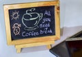 Closeup chalkboard with the phrase coffee break written on it chalkboard. recharge