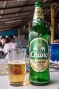 Closeup of Chang Beer bottle and glass in Ban Bai Bua, Thailand